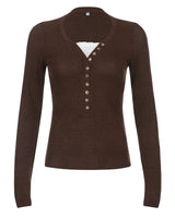 Flat lay of ribbed roll neck top showing overall shape and front detail