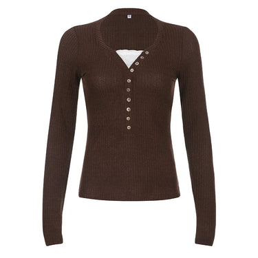 Flat lay of ribbed roll neck top showing overall shape and front detail