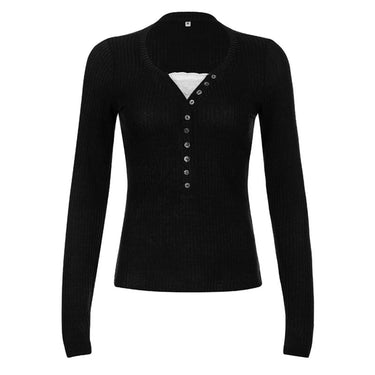 Model wearing ribbed roll neck top from a distance showing full length