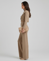 Full-length view of the coordinated knit two-piece set