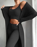 Close-up of long-sleeve cuff detail on ribbed knit top
