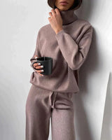 Front view of ribbed knit co-ord set with turtleneck sweater and straight-leg trousers