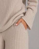Detail shot of the V-neckline on the ribbed knit jumper
