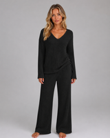 Close-up of the ribbed texture on the wide leg trousers