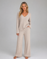 Front view of ribbed knit co-ord set with V-neck jumper and wide leg trousers