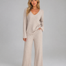 Front view of ribbed knit co-ord set with V-neck jumper and wide leg trousers