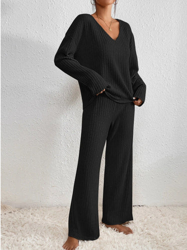 Close-up of the ribbed knit texture on the top and trousers