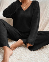Detail shot of the V-neckline on the ribbed knit top