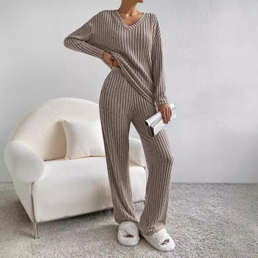 Flat lay of the ribbed knit top and wide-leg trousers side by side