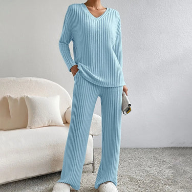 Close-up of the ribbed knit waistband on the wide-leg trousers