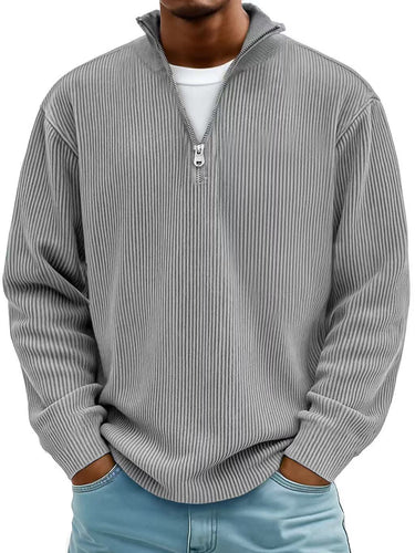 Three-quarter view of men's ribbed quarter-zip jumper