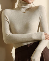 Side profile showing the slim fit silhouette and long sleeves