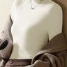 Front view of a ribbed roll neck knit top in a slim fit
