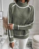 Close-up of the ribbed roll neck collar in green