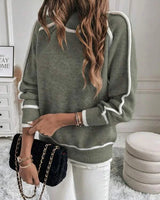 Rear view of the green roll neck sweater showing clean back panel