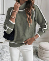 Front view of a green roll neck sweater with contrast accent detailing