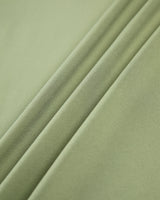 Back view of the ruched long sleeve crop top
