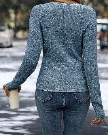 Back view of the long-sleeve jumper showing the relaxed dropped shoulder cut