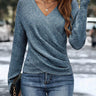 Front view of a ruched V-neck jumper with dropped shoulders and long sleeves