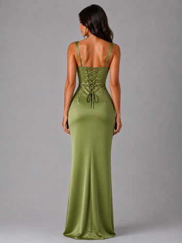 Side view showing the fluid floor-length skirt and gathered waist detail