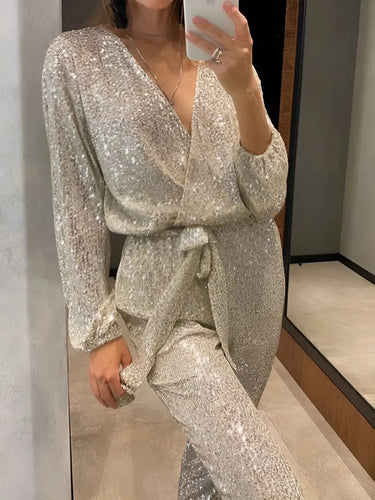 Sequin Belt Jumpsuit with V-Neckline and Long Sleeves