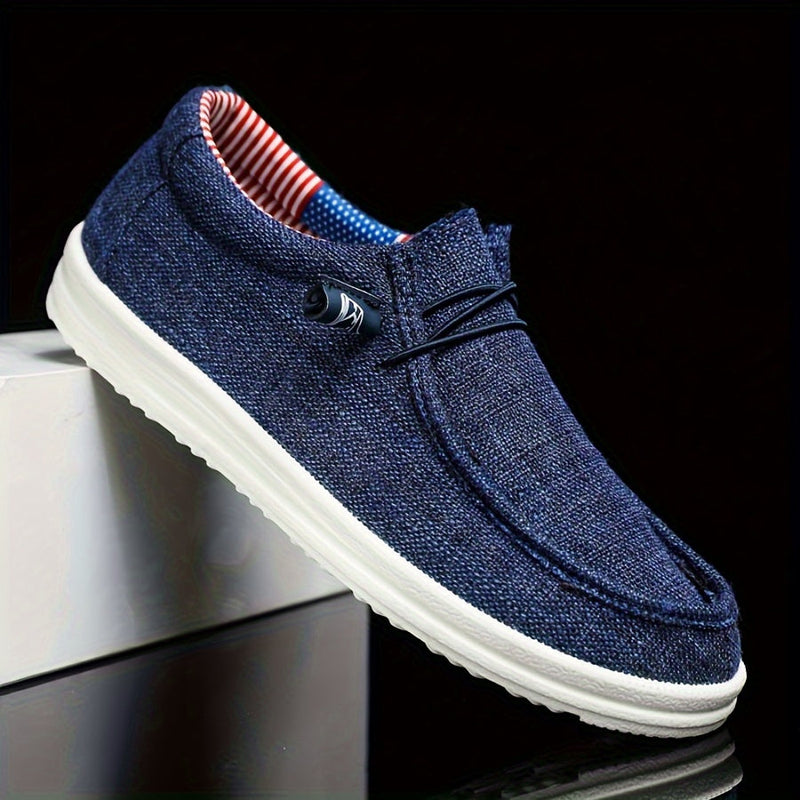 Sleek Men’s Slip On Loafers With Metal Bar Detail And Moc Toe Stitching