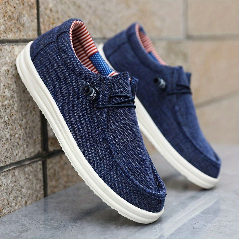 Sleek Men’s Slip On Loafers With Metal Bar Detail And Moc Toe Stitching