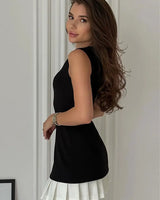 Sleeveless Mini Dress with Pleated Hem