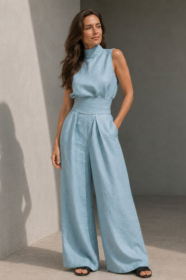 Back view of sleeveless jumpsuit in off-white with wide-leg trousers
