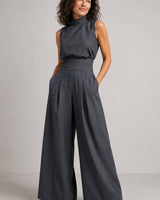 Sleeveless wide-leg jumpsuit in light blue, full-length front view