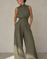 Sleeveless wide-leg jumpsuit with cinched waist in green, front view