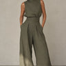 Sleeveless wide-leg jumpsuit with cinched waist in green, front view