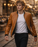 Close-up of a zipped side-entry pocket on a leather bomber jacket