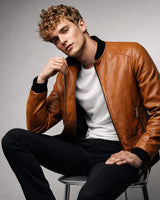 Rear view of a men's slim-fit leather bomber jacket