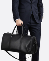 Front view of a spacious duffel bag with zip closure and padded handles