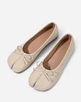 Ballet flat worn on foot, front angle