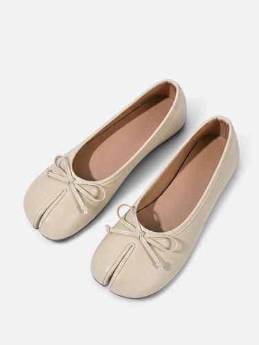 Ballet flat worn on foot, front angle