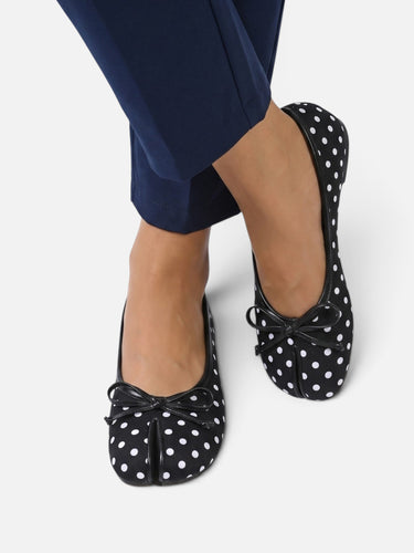 Pair of split-toe ballet flats placed side by side
