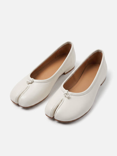 Close-up of the split toe and fine topstitching on the leather upper