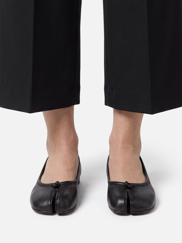 Rear view of the ballet flat showing the low heel and leather lining