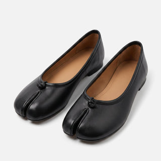 Leather split-toe ballet flat with knotted strap across the upper, side view