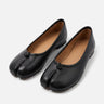 Leather split-toe ballet flat with knotted strap across the upper, side view