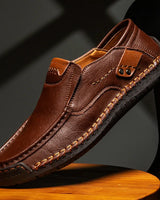 Close-up of contrast stitching detail on the toe of the loafer