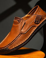 Men's slip-on loafers with stitched detailing on the toe box and sides