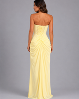 Close-up of ruched waist detail on strapless maxi dress