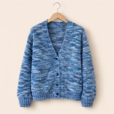 Close-up of the striped knit pattern and open-front detail of the cardigan