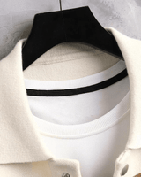Detail shot of the jacquard knit texture and colour block stripes on the cardigan