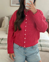 Striped cardigan styled open over a casual outfit