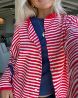 Striped cardigan worn buttoned up showing full silhouette