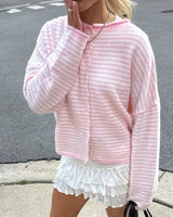 Detail of cuff and sleeve length on women's striped knit cardigan
